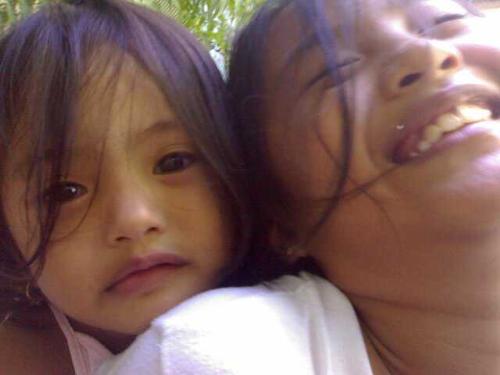 andrea and althea - the perfect picture of sisters...one laughing, one crying