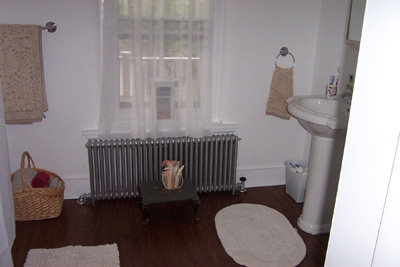 My bathroom - My most favorite room in my home! I love my clawfoot tub, pedastal sink and my table of goodies!