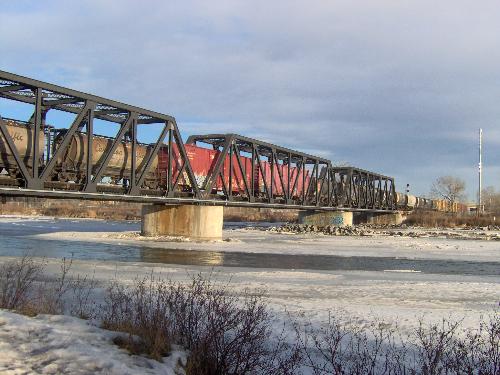 A very long freight train..... - I ran underneath this train on my morning jog and when I came back 10 minutes later it was still coming...

It was a big one....