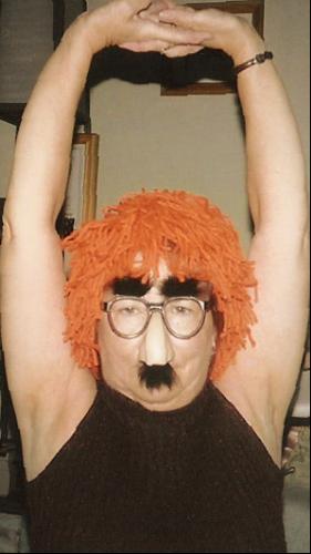 me - I took this photo of myself using a delayed exposure. I had a couple shots left on the roll and wanted to use them up. This is my Hallowe'en pic for 2007.