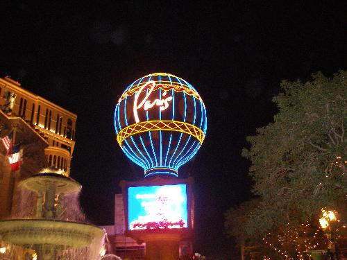 Front Of Paris Hotel - This is a picture of the front of the Paris Hotel & Casino at night. It was a very cool view and so was the weather.