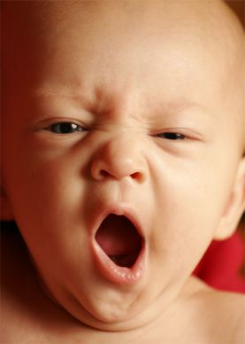 Are you yawning now? - Picture of baby yawning.