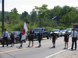 4-H club -- Jr. Fire Dept. - Kids marching during Old Home Days parade