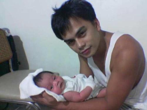 My cute babies - This is a picture of my husband and our eldest daughter, Cedy, a few days after she was born..