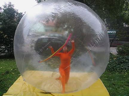 girl in ball - a girl walking within ball