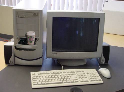 Computer with a cup holder - Computer with a cup holder.The CD-ROM drive was being mistaken for a cup holder by some customer.