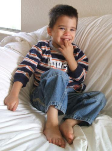Brian Jr. - This is my little man...(one of 3 sons)...I finally got him to stop crying long enough to smile!! Vey stubborn, he refused to pose with any of his sisters!