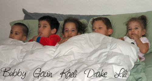 All my kids! - They were all comfy and cozy in mom and dad's bed watching a movie!! Never lasts long tho!