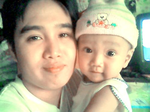 My son joji & his son, Clark - Joji is my second child, My first child among the four to have his family. My other three children are still single.