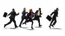 business people running - picture of business people running for what could be a bus,lift or cause their late for work