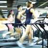 runners on treadmills - picture of people running on treadmills.this is a good way to stay fit and you can buy one for the home instead of going to the gym.but going to the gym your more likly to do a work out