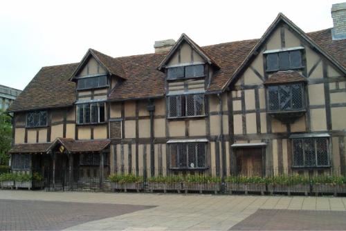 Shakespeare's House - Shakespeare's Birthplace is situated in the centre of town on Henley Street, Stratford-upon-Avon and was the place where Shakespeare was born in 1564 and lived with his family.  It is also highly probable that Shakespeare and Anne lived here when they were first married.   Shakespeare's Father, John acquired the main part of the property in 1556 and parts of the building was owned by descendants of Shakespeare's sister Joan until 1806.   A pilgrimage for visitors for centuries, the property was acquired by a Trust in 1847.  The House A trip to Shakespeare's Birthplace allows the visitor to take a step back in time and see what life was like for the young Shakespeare growing up in Stratford-upon-Avon. The house has been painstakingly restored, and through research includes both original and replica items similar to those which would have adorned the property when Shakespeare was a boy.  Contrary to popular belief the Tudors were huge fans of colour and Shakespeare's Birthplace reflects this. Beautiful painted cloths adorn the walls and brightly coloured fabrics fill the rooms, all hand dyed in the traditional Tudor way.