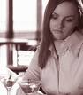 An Alcoholic Person - This photo is describing in itself how an alcoholic person will look like. She is not okayed, and might be feeling somewhat sleepy.