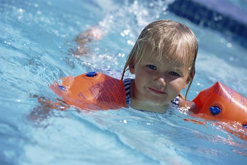 swimming kid - i love to swim.and i think swimming is a great excercise for the fore limbs and hind limbs.swimming is my favorite sport and i can stay very long under water.some say swimming is rubbish coz it spoils the eyes.is that true?