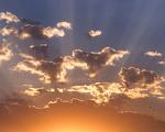 sun rays in the summer - picture of sun rays in the sky in summer time.These rays can be harmful and the sun can burn you even though you don't think the sun rays are getting through