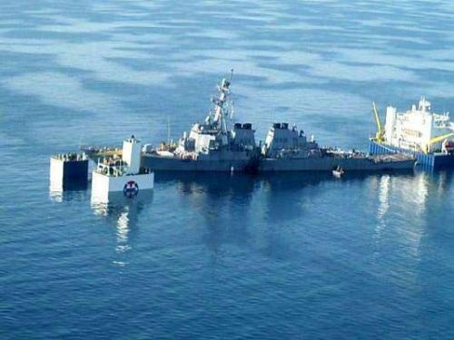 The U.S.S. Cole - The U.S.S. Cole being pulled back home.