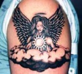 Tattooism - Angel tattoo on big broad shoulder.