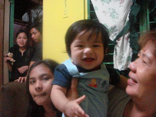 My son and his grandmama - This is my son being held by his grandmama. Grandma loves him so much.