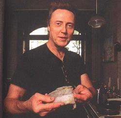 Christopher Walken, Cooking at Home - He's explaining how to cook tiger shrimp. Funny guy. Great dancer, good cook. What a perfect combination. But you can see in his eye that he's saying, 'Don't be afraid, see? It's just me and a shrimp, nothing scary here...' ;)