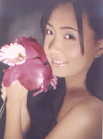 a grad pic extra - is this me or what? what lighting and make-up can do to an ugly face!!! n_n