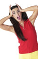 screaming coz of stress - The girl is screaming and pulling her hair out due to stress.