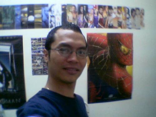 me in my poster room - picture taken in my poster room. Poster mostly from movies.