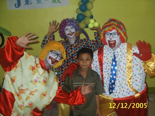 Birthday fun - This picture was taken at my son's 7th birthday party. he didn't know that there would be clowns in his party, he had a lot of fun.