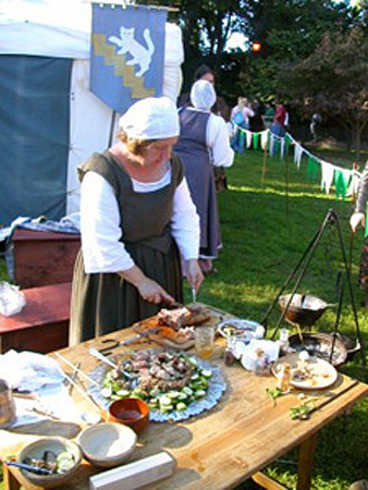 Cooking Demo - A woman at a cooking demonstration.
