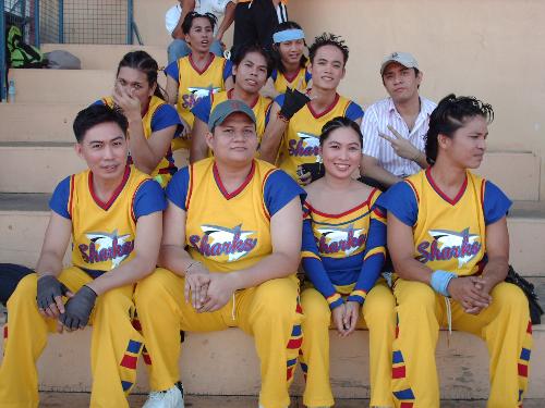 The Cheerleader - It was the culminating and final event of the company's annual sports fest. In this picture, I'm sorrounded by guys, :). Well, these guys actually were with me for business, monkey business, hehehe! It was their business to make a monkey out of me as they made me climb on top of their shoulders and even threw me up.. oh my!