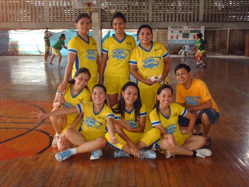 Volleyball Girls - Yup, I'm a volleyball player too! That's me with my arms wide open :) The guy in glasses is our coach Sir Josel. Ok, from left to right, up, that's Karen, Mhemhe, Melchar, down, that's Gesley, then me, then Cindy, then Joy, then Sir Josel. This photo was taken before the Semifinal game of the company's Sports Fest, yeah! we reached the semis, huh!