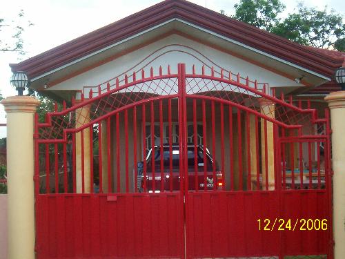Home Sweet Home - Yes! Home sweet home... I love our home, it's relaxing and cozy and full of love. Wait till you see the inside! ;) [This photo was taken last December 2006 when I went home to Davao City for the New Year celebration]