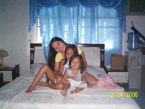 Three beauties - I love playing mom to my nieces, such cute and adorable angels.. Oh, I miss them now :( Well, thanks to this picture I somewhat feel them with me all the time. This photo was taken last December 2006, inside my parents' room. I love kids, especially my cute little angels :)