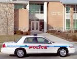Police Car - Police car parked outside an apartment building. Police Car - Police car parked outside an apartment building.