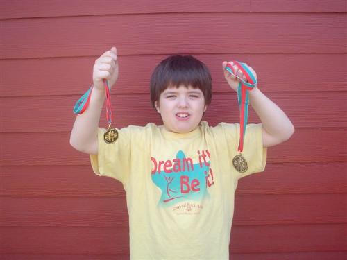 Two-time Gold Medalist! - We are so proud of our son and he&#039;s ecstatic as well for winning two, count them, two Gold Medals in Special Olympics - &#039;individual basketball skills&#039; competitions. He won his first one in January at Regional competition and his second one at State competition in March (St. Patrick&#039;s Day), 2007. He&#039;s going to be in our local paper (all of about 8 pages; our paper is very small...lol) next week..!
Next competition will be first Saturday in May - Track and Field, so I&#039;ll be preparing him for that soon.