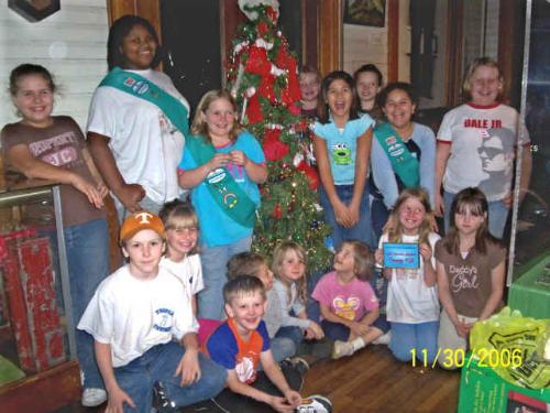 Troop 58 tree at Depot - This is the tree put up by Troop 58. They are the 4th grade Juniors In Etowah. This is our biggest event as 4 troops in our small town all converge on the L&N Depot to decorate our trees. We spends one day a week for 2-4 weeks making ornaments for the tree. We also decorated one In the slightly larger town nearby, Athens. They are lighted and set up outside. The theme of this tree was Happy Birthday Jesus! And so was our float.