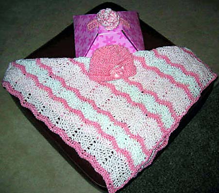 Monica's Simple Ripple Crochet Baby Afghan - This is an afghan I made to donate to Hugs & Kisses Crafters. I have written the pattern for anyone who wants to replicate it: http://www.gather.com/viewArticle.jsp?articleId=281474976720718