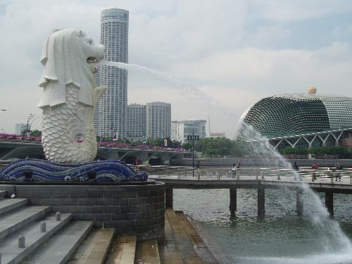 singapore - A view of the Merlion, the Esplanade and Raffles city.