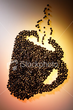 coffee arts - beans of coffee make a cup of coffee