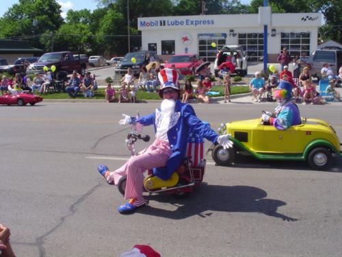 Sundown Salute 4th of July parade. - A silly clown or two. Sundown Salute 4th of July parade. - A silly clown or two.