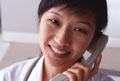 calls, phone calls - Apleased doctor making call.