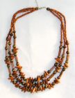 An example of a native necklace - This is an example of a native necklace. It is formed from coco shells. Look how attractive it is. :)