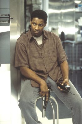 John Q - John Q is a 2002 movie starring Denzel Washington as John Quincy Archibald, a father and husband whose son is diagnosed with an enlarged heart and then finds out he cannot receive a transplant because insurance won't cover it. The title is a reference to the term John Q. Public, indicating that the struggles in the story could be experienced by any average American.  A protest against the policies and hidden procedures of manyof today's insurance companies, John Q also stars Anne Heche, Ray Liotta, and Robert Duvall, among others.