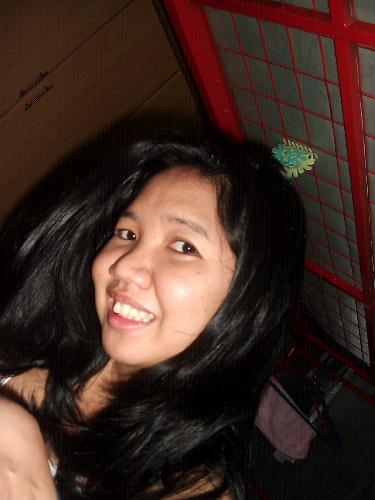 just being me... - taken after clinical graduation..just having fun with the cam.. enjoying my curly hair
