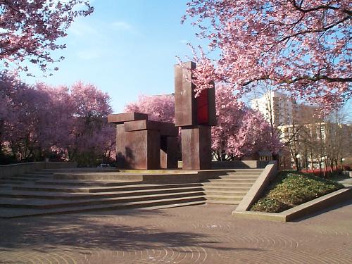 Public Art - One of many public artworks downtown. This one is a little bit hidden and only accessible to pedestrians. Photo taken in the spring with the plum trees in full bloom.