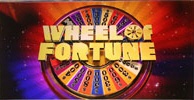 Wheel of Fortune  - Wheel of Fortune  From Wikipedia, the free encyclopedia  Wheel of Fortune is an American television game show originally devised by Merv Griffin, who also created Jeopardy!. The show debuted as a daytime program on NBC on January 6, 1975. Three contestants compete against each other to solve a word puzzle similar to those seen in the game Hangman. The name of the show comes from the large wheel that determines the dollar amounts and prizes won (or lost) by the contestants.