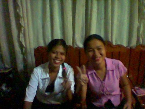me and my sister - this is me and my sister Gretchen. We have just come home from church when this picture was taken. WE don't look like sisters coz we don't look anything alike but we sure love each other... :)