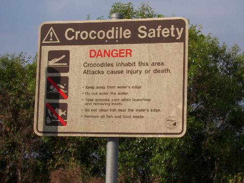 croc warnings - took this photo in Darwin, Australia a while back, and yes i took a god look around beforehand in case i was being lined up for lunch, i did see some crocs further out in the water and they where easily big enough to eat me. i was pretty surprised later when having a few drinks with the locals and they told me that tourists go in the water all the time thinking that the signs are a &#039;gimmick&#039; thing, even so far as one dad (nationality witheld) saying "is that for real my 10yr old son wants to swim", now i realise our kids get on our nerves now and then but this seems a bit extreme to me.
what do you think?