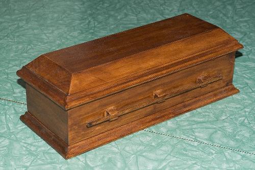Coffin Humidor - This is a cigar humidor that my husband built. He loves his cigars and would like his ashes (AND a good cigar) put in this and buried when he dies. Yeesh!
