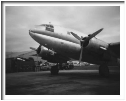 Vintage Airplane - Bill McLeod (my husband) shot this with a Holga camera. It is a modern photograph of a vintage airplane.