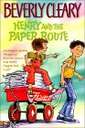 Paper Route - A boy pulling papers and girl on a red wagon.